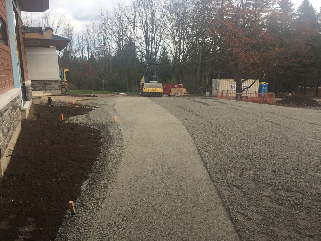 Compacting driveway aggregate